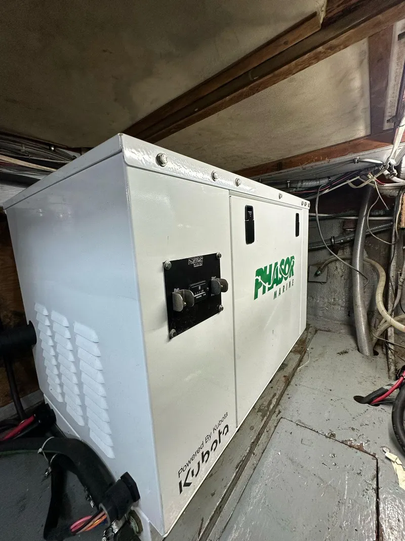 Slide: The Image of Engine room of 1974 Bertram 42 Motor Yacht with Kubota Phaser generator. - 32