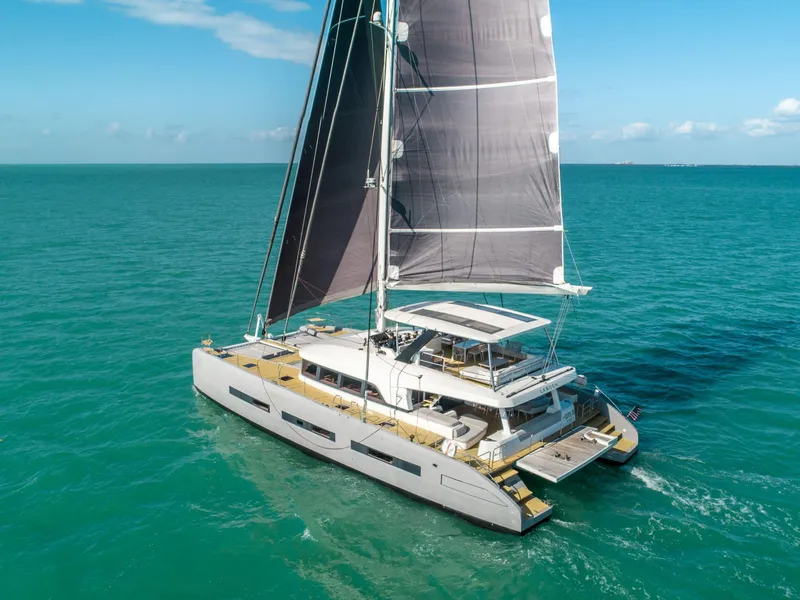 Slide: The Image of Luxury Lagoon SEVENTY 7 catamaran sailing on turquoise waters, 2020 model. - 29