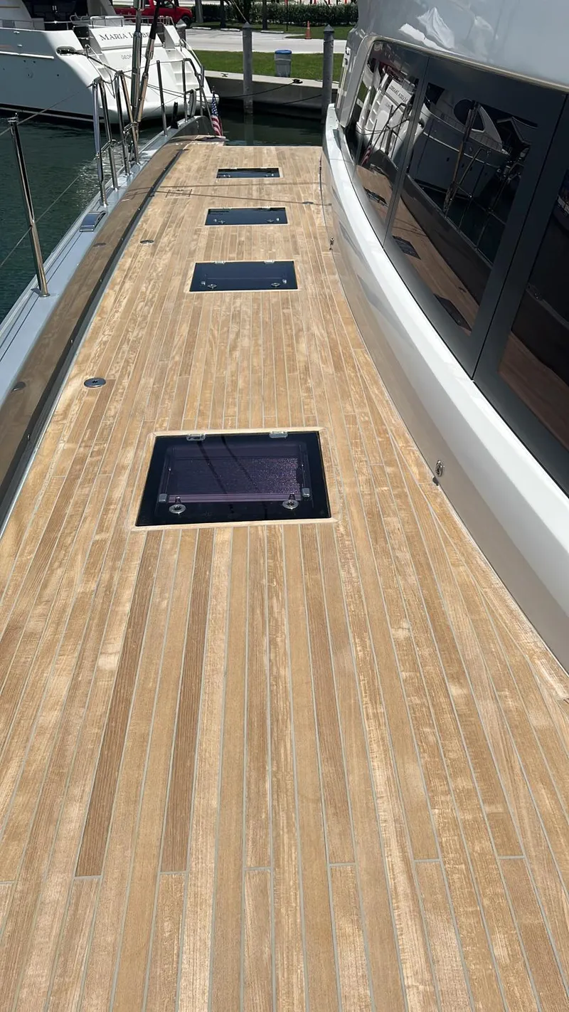 Slide: The Image of Deck of 2020 Lagoon SEVENTY 7 yacht with sleek design and modern windows. - 37