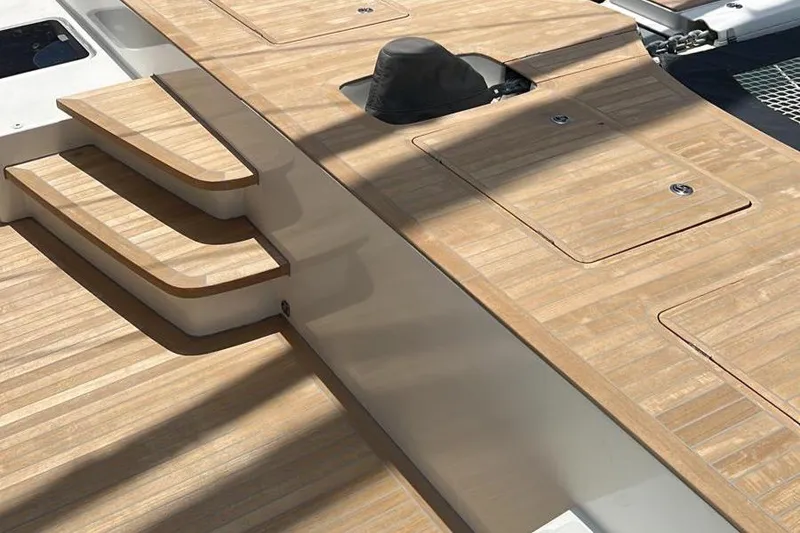 Slide: The Image of Teak deck of 2020 Lagoon SEVENTY 7 yacht with sleek design and integrated steps. - 38