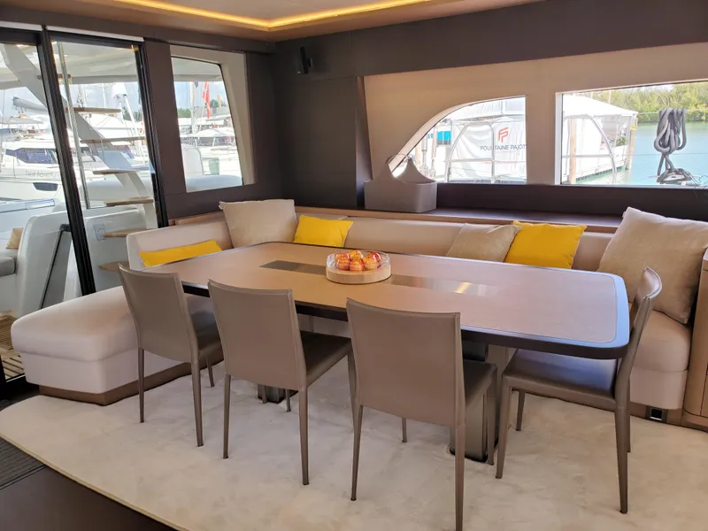Slide: The Image of Luxurious interior of 2020 Lagoon SEVENTY 7 yacht with elegant dining area and modern decor. - 5