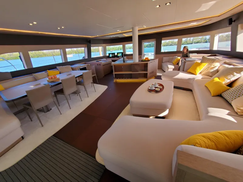 Slide: The Image of Luxurious interior of 2020 Lagoon SEVENTY 7 yacht with elegant seating and dining area. - 6