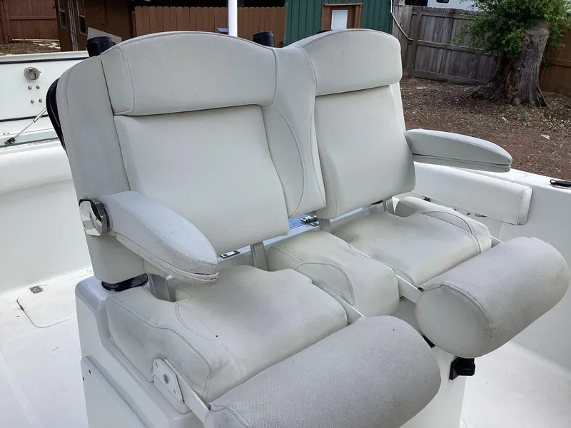 Slide: The Image of 2018 Sea Hunt Gamefish 27 boat seats, white upholstery, dual seating arrangement. - 14
