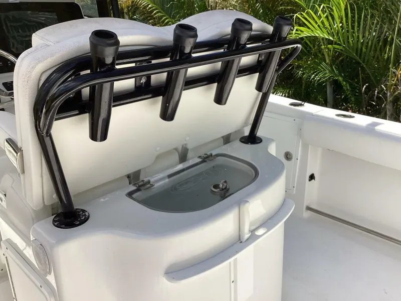 Slide: The Image of 2018 Sea Hunt Gamefish 27 boat with rod holders and livewell. - 49