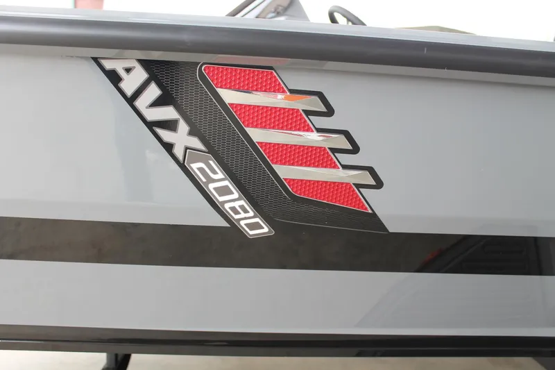 Slide: The Image of 2025 Vexus AVX2080 boat logo with red and black design elements. - 17