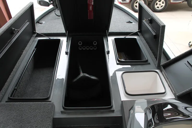 Slide: The Image of 2025 Vexus AVX2080 boat storage compartments with open lids, showcasing ample space and organization. - 7