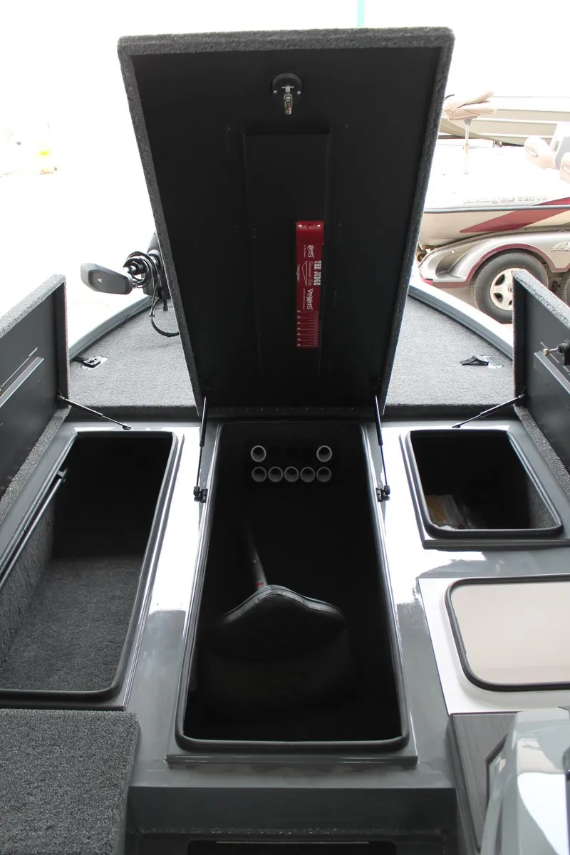 Slide: The Image of 2025 Vexus AVX2080 boat storage compartments with open hatch and organized interior layout. - 8