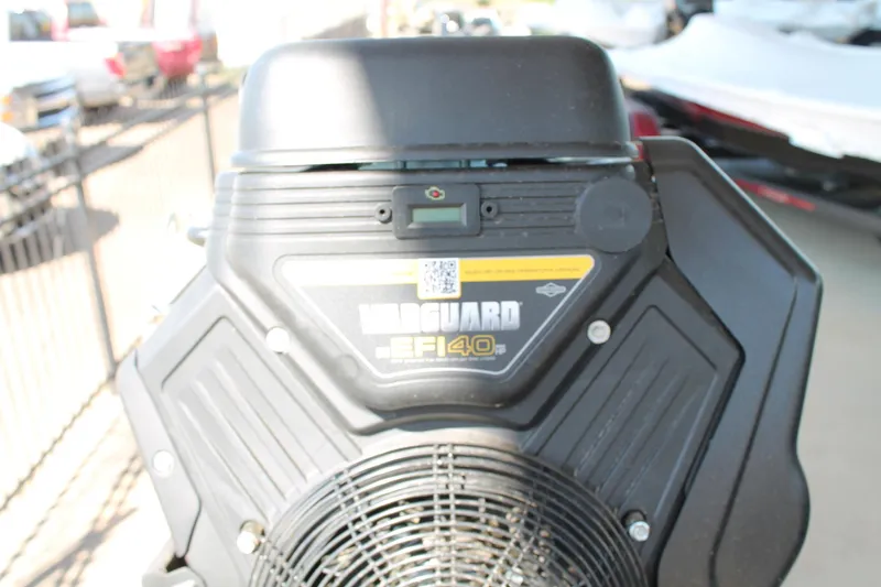 Slide: The Image of Vanguard EFI 40 engine on 2025 War Eagle 750 Gladiator boat, close-up view. - 8