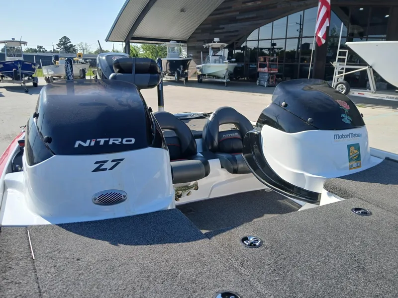 Slide: The Image of 2015 Nitro Z7 boat with dual motors at a dealership. - 12