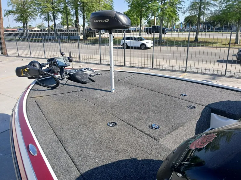 Slide: The Image of 2015 Nitro Z7 boat deck with trolling motor and control panel. - 15