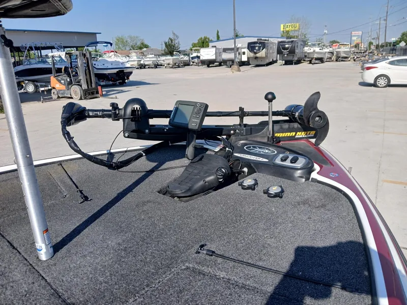 Slide: The Image of Nitro Z7 2015 boat deck with trolling motor and control panel in a marina. - 5