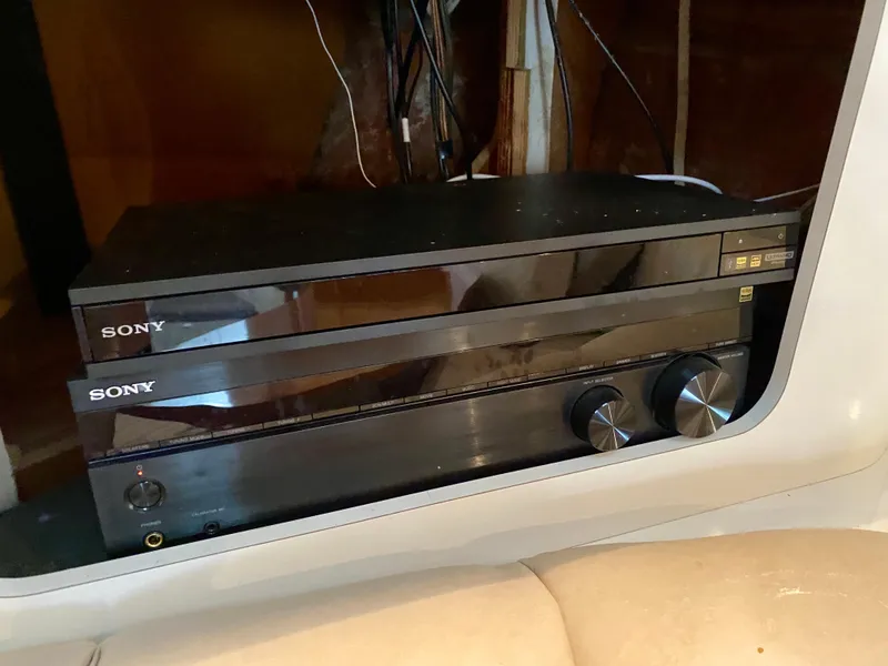 Slide: The Image of Sony audio equipment inside a 1996 Sea Ray 450 Sundancer yacht. - 28