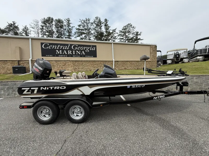 Slide: The Image of 2014 Nitro Z-7 boat at Central Georgia Marina, featuring a Mercury motor. - 1