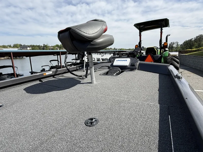 Slide: The Image of 2020 Ranger RT198P boat deck with seat and Lowrance equipment by the water. - 5