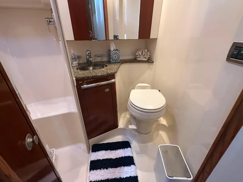 Slide: The Image of Luxurious bathroom in 2005 Sea Ray 420 Sedan Bridge yacht with modern amenities. - 20