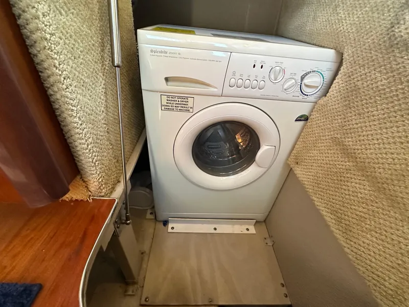Slide: The Image of Washing machine inside 2005 Sea Ray 420 Sedan Bridge yacht cabin. - 28