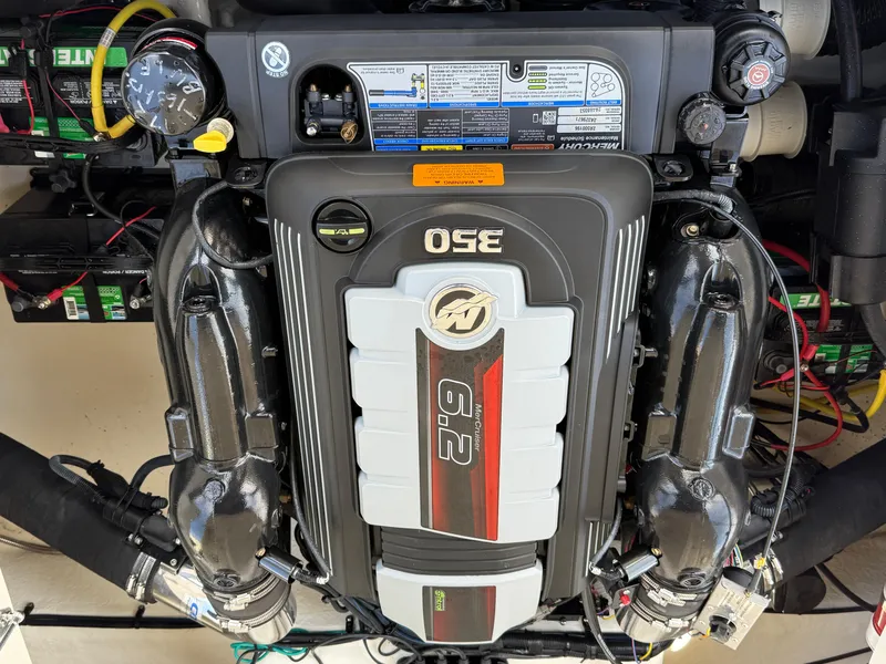 Slide: The Image of Engine of a 2016 Chaparral 244 boat, featuring a 6.2L MerCruiser 350. - 14