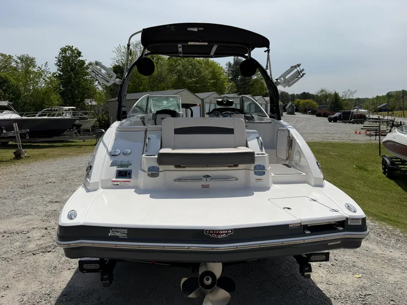 Slide: The Image of 2016 Chaparral 244 boat rear view in outdoor setting. - 4