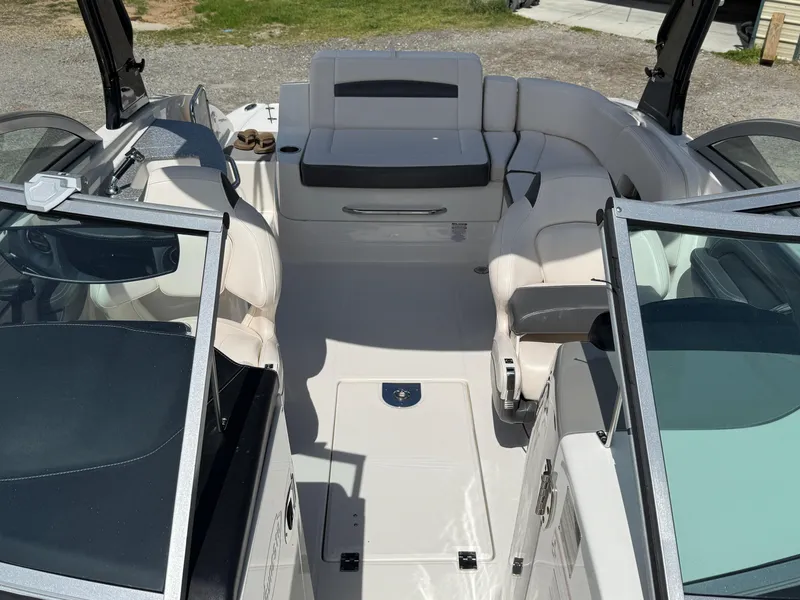 Slide: The Image of Interior of a 2016 Chaparral 244 boat with spacious seating and modern design. - 8