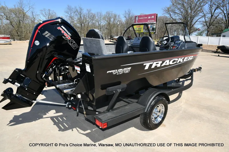 Slide: The Image of 2025 Tracker Pro Guide V-175 Combo boat on trailer, featuring Mercury Pro XS engine. - 11