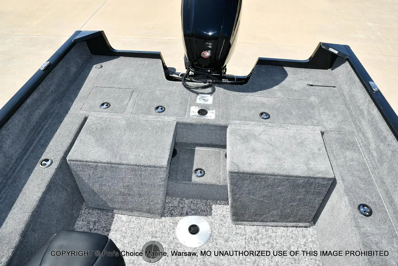 Slide: The Image of 2025 Tracker Pro Guide V-175 Combo boat interior with carpeted storage compartments. - 13