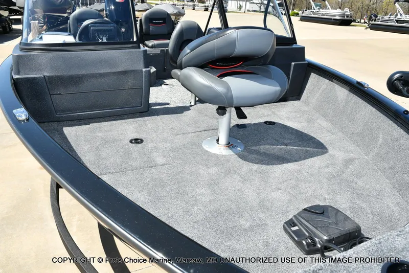 Slide: The Image of 2025 Tracker Pro Guide V-175 Combo boat interior with gray seating and carpeted deck. - 28