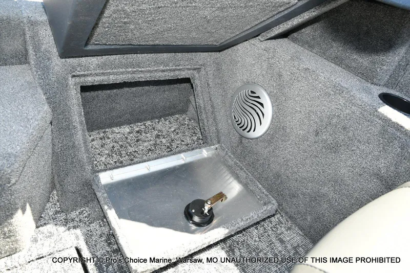 Slide: The Image of 2025 Tracker Pro Guide V-175 Combo interior with speaker and storage compartment. - 46