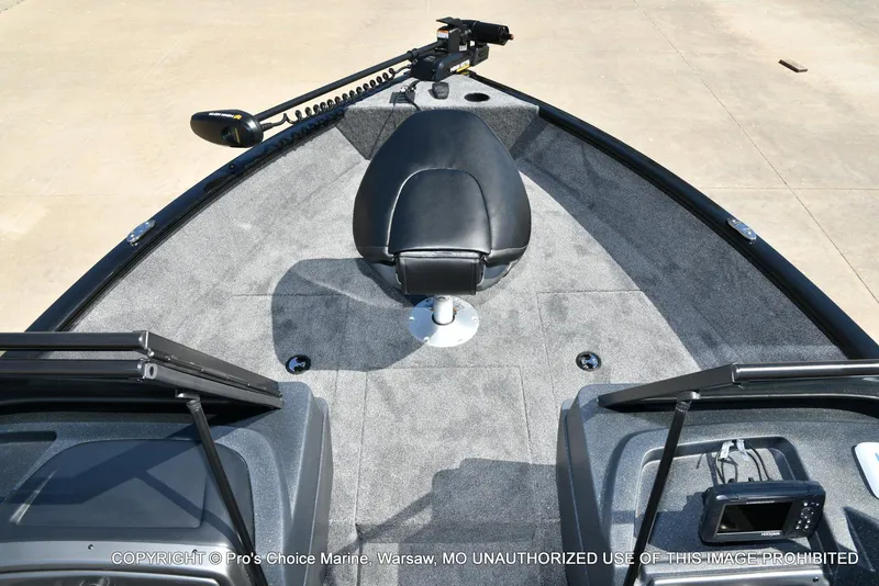 Slide: The Image of 2025 Tracker Pro Guide V-175 Combo boat interior with seating and navigation equipment. - 9