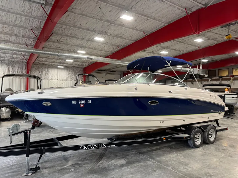 Slide: The Image of 2004 Chaparral 260 SSi boat on trailer in indoor storage facility. - 1