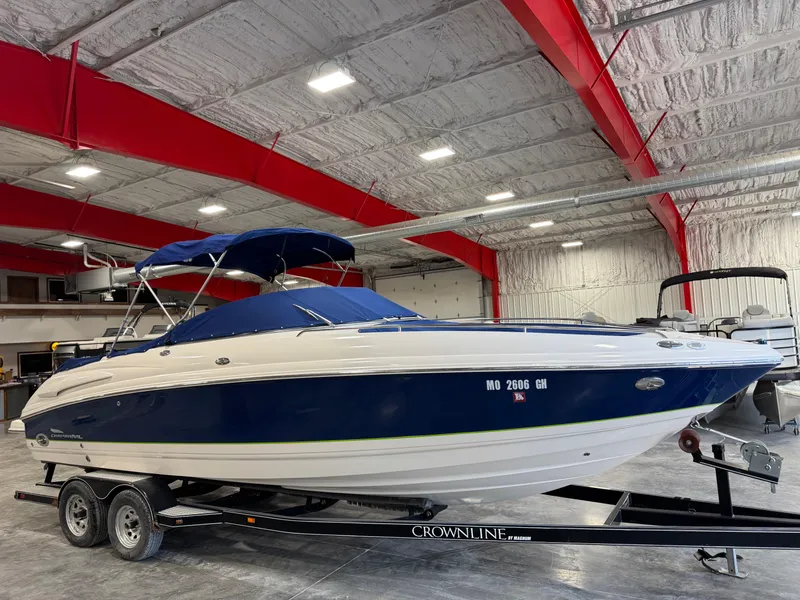 Slide: The Image of 2004 Chaparral 260 SSi boat on trailer in indoor storage facility. - 11