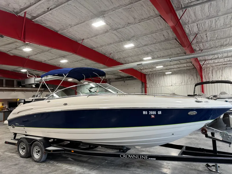 Slide: The Image of 2004 Chaparral 260 SSi boat on trailer in indoor storage facility. - 2