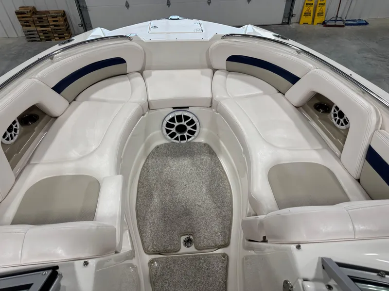 Slide: The Image of 2010 Chaparral 264 Sunesta boat interior with spacious seating and modern design. - 14