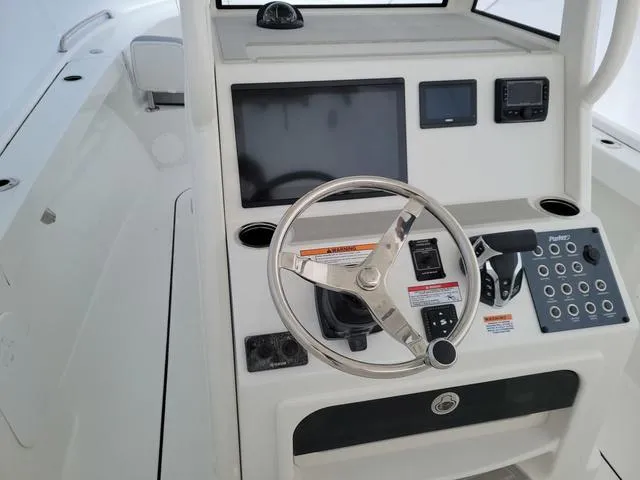 Slide: The Image of Parker Marine 2400 Center Console 2025 - 2