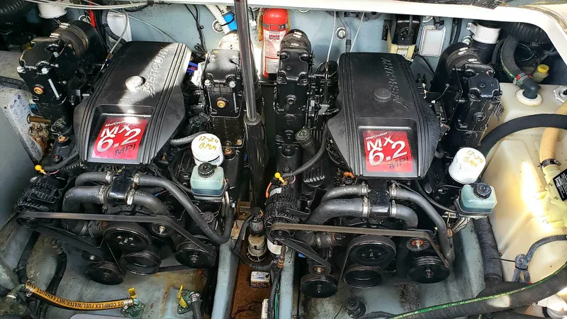 Slide: The Image of Twin MerCruiser MX 6.2 engines in a 2002 Sea Ray 300 Sundancer boat. - 33