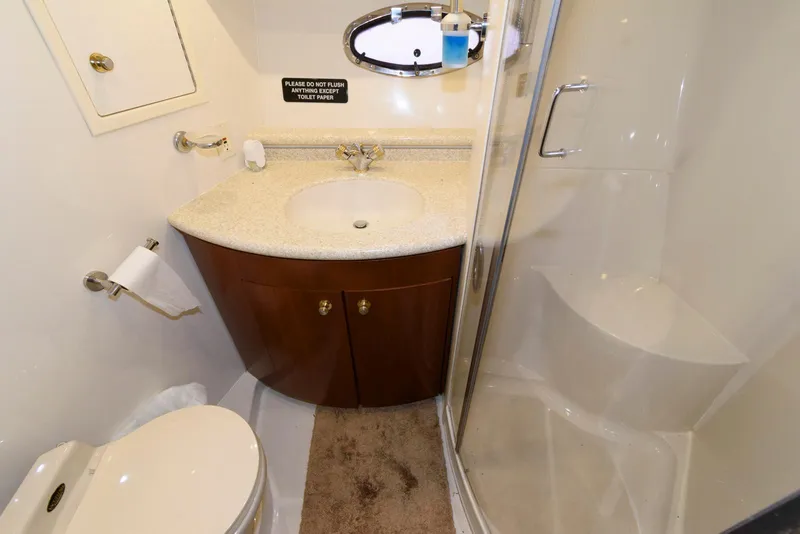Slide: The Image of Bathroom interior of 1999 Carver 450 Voyager Pilothouse with shower and sink. - 20