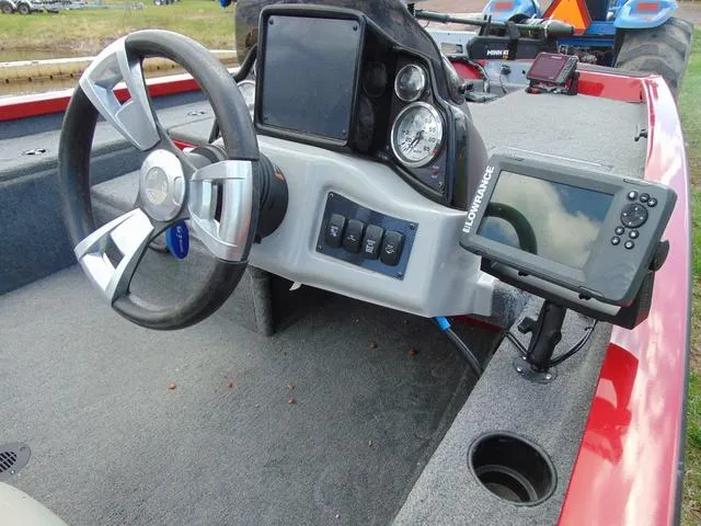 Slide: The Image of 2018 G3 Sportsman 17 boat dashboard with steering wheel and Lowrance fish finder. - 11