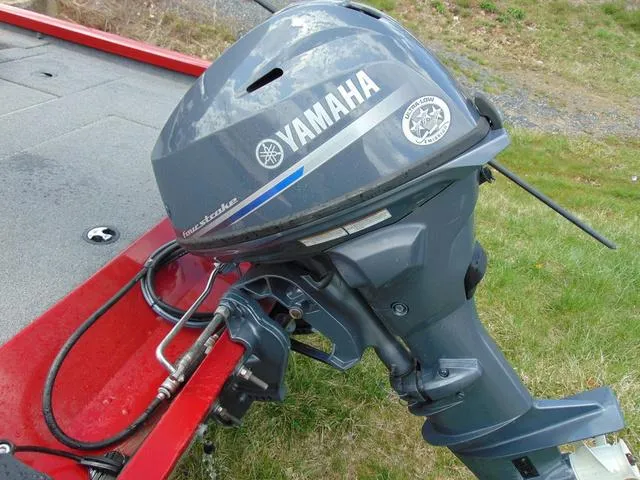 Slide: The Image of 2018 G3 Sportsman 17 with Yamaha outboard motor on red boat. - 5
