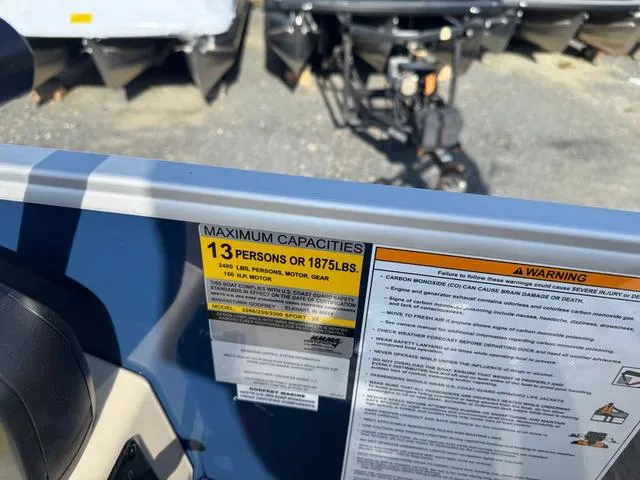 Slide: The Image of Capacity label on 2025 Godfrey Sweetwater 2286 SBX Tritoon, indicating 13 persons or 1875 lbs. - 11