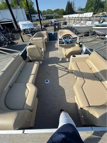 Slide: The Image of 2025 Godfrey Sweetwater 2286 SBX Tritoon with Yamaha 150, featuring spacious seating and modern design. - 7