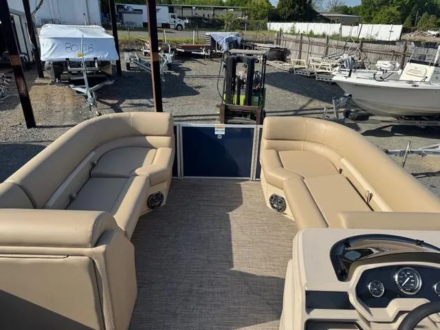Slide: The Image of 2025 Godfrey Sweetwater 2286 SBX Tritoon with Yamaha 150, featuring spacious seating and modern design. - 9