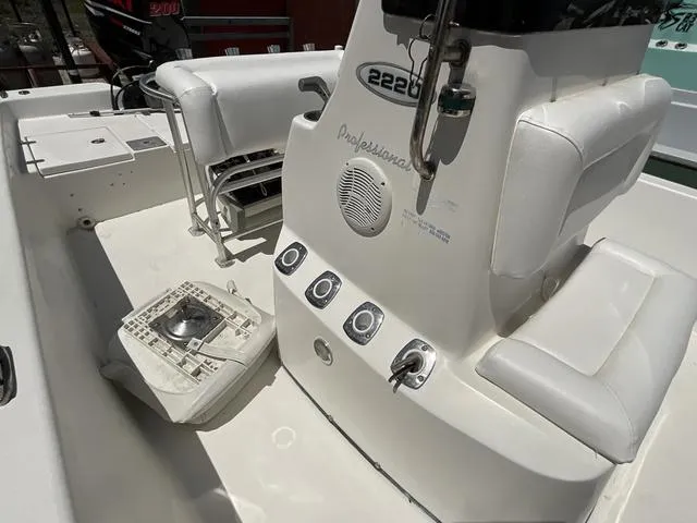 Slide: The Image of 2007 Blazer 2220 Pro boat interior with seating and control panel. - 16
