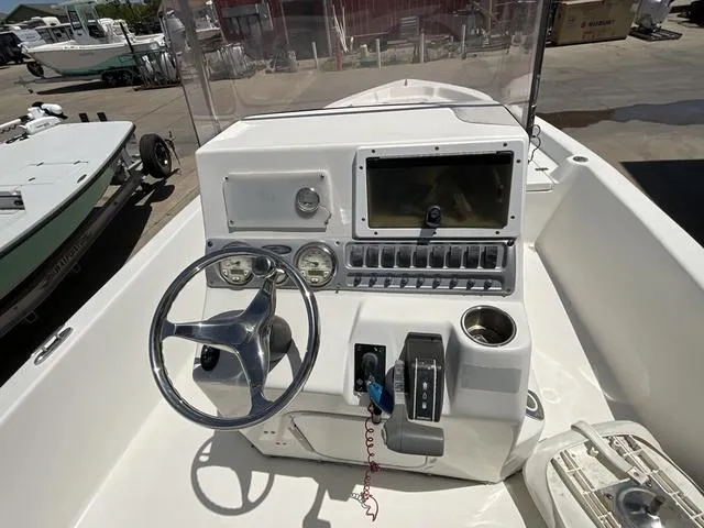 Slide: The Image of 2007 Blazer 2220 Pro boat console with steering wheel and controls. - 17