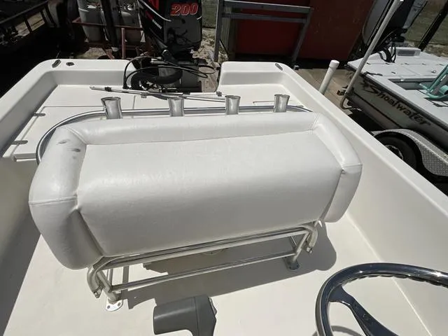 Slide: The Image of 2007 Blazer 2220 Pro boat interior with white seating and steering wheel. - 18