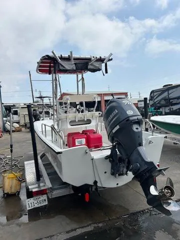 Slide: The Image of 1984 Boston Whaler 17 Montauk boat with Yamaha outboard motor on trailer. - 6