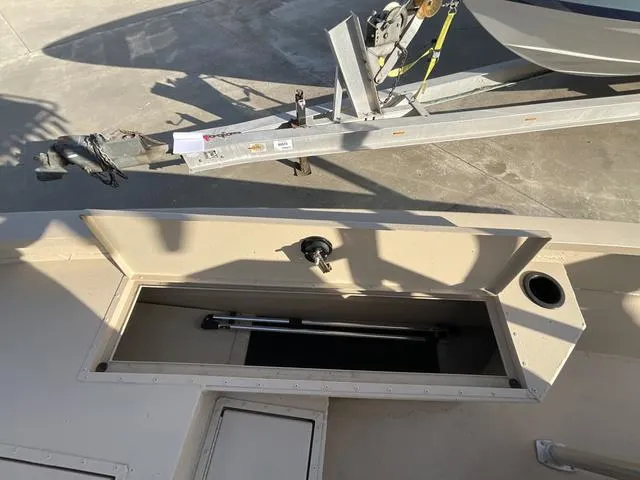 Slide: The Image of 2023 G3 BAY20GX boat storage compartment with trailer hitch visible. - 10