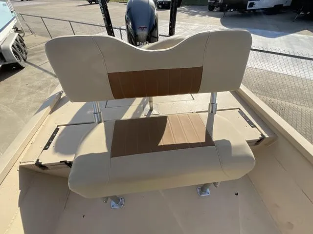 Slide: The Image of 2023 G3 BAY20GX boat seat with beige and brown upholstery, outdoor setting. - 15
