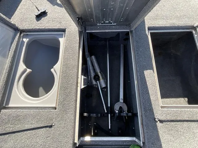 Slide: The Image of 2015 Tracker Pro 175 boat storage compartments with fishing gear and accessories. - 8