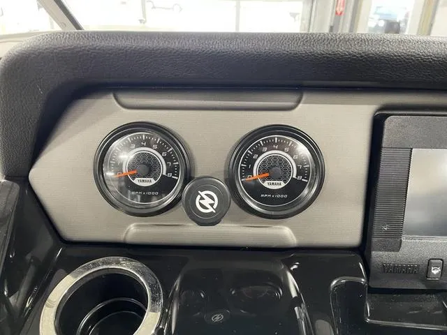 Slide: The Image of Dashboard of 2018 Yamaha Boats 212 Limited S with gauges and controls. - 27