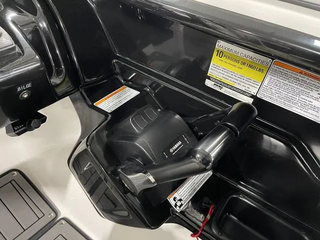 Slide: The Image of Control panel of 2018 Yamaha Boats 212 Limited S, showing throttle and capacity warning. - 30