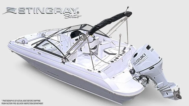 Slide: The Image of 2025 Stingray 201 DC boat with Suzuki outboard motor, sleek design, and modern features. - 1